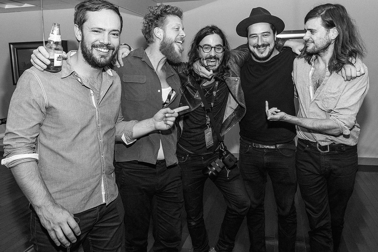 Ty Johnson and Mumford & Sons shot backstage in New York City